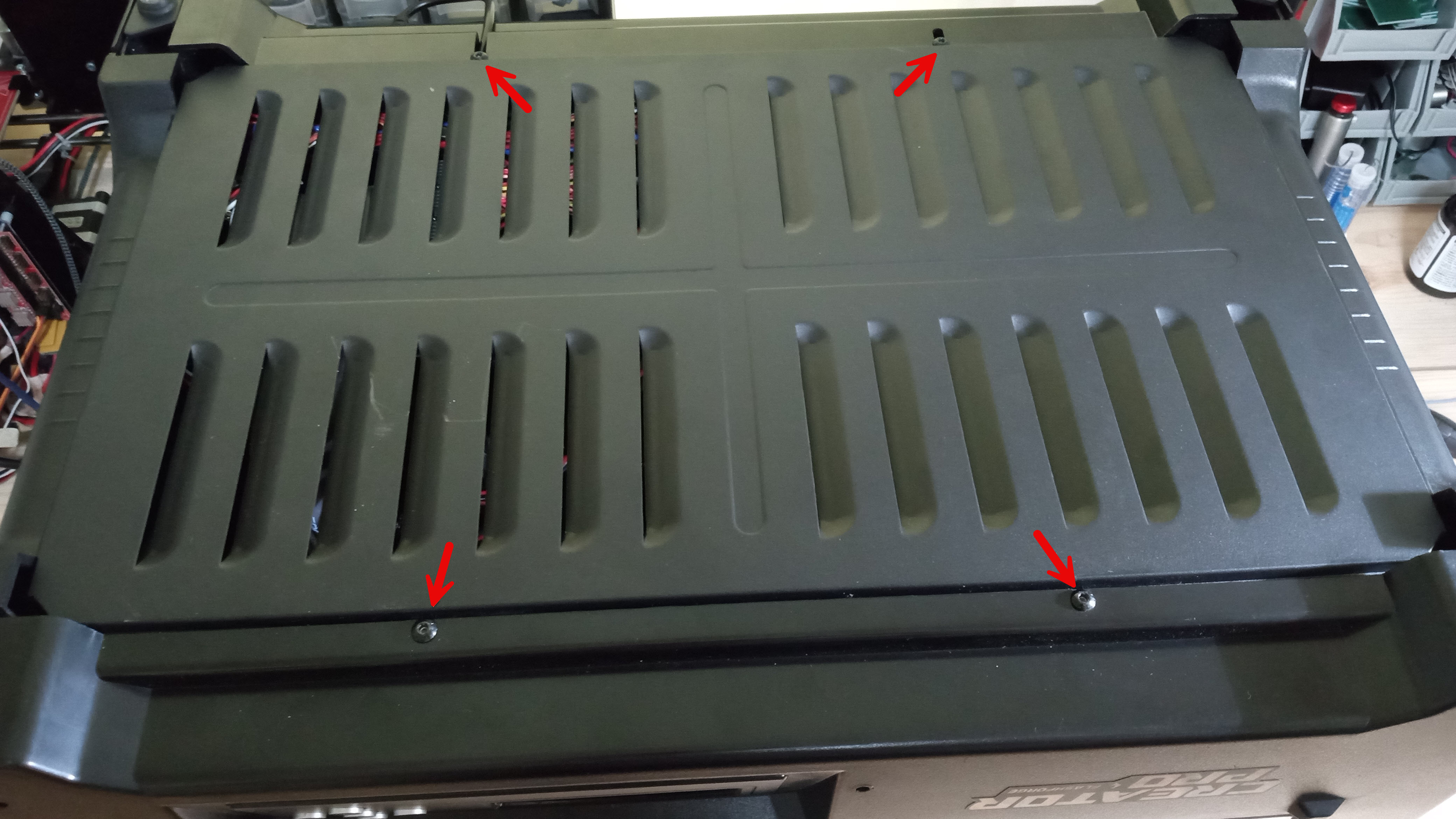 Photo showing the location of the 4 bolts on the Creator Pro vent